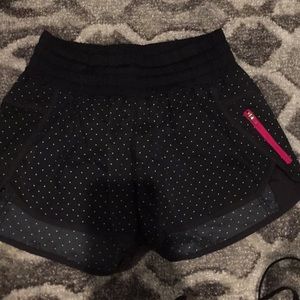 Black polka dot lululemon shorts size 6